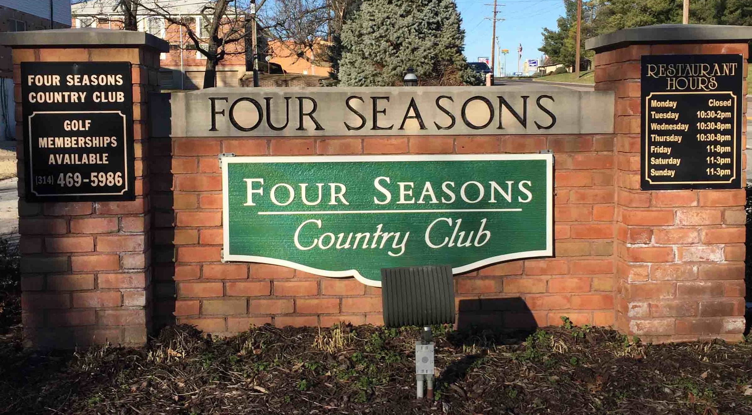 Large Brick Entrance Signs to Four Seasons