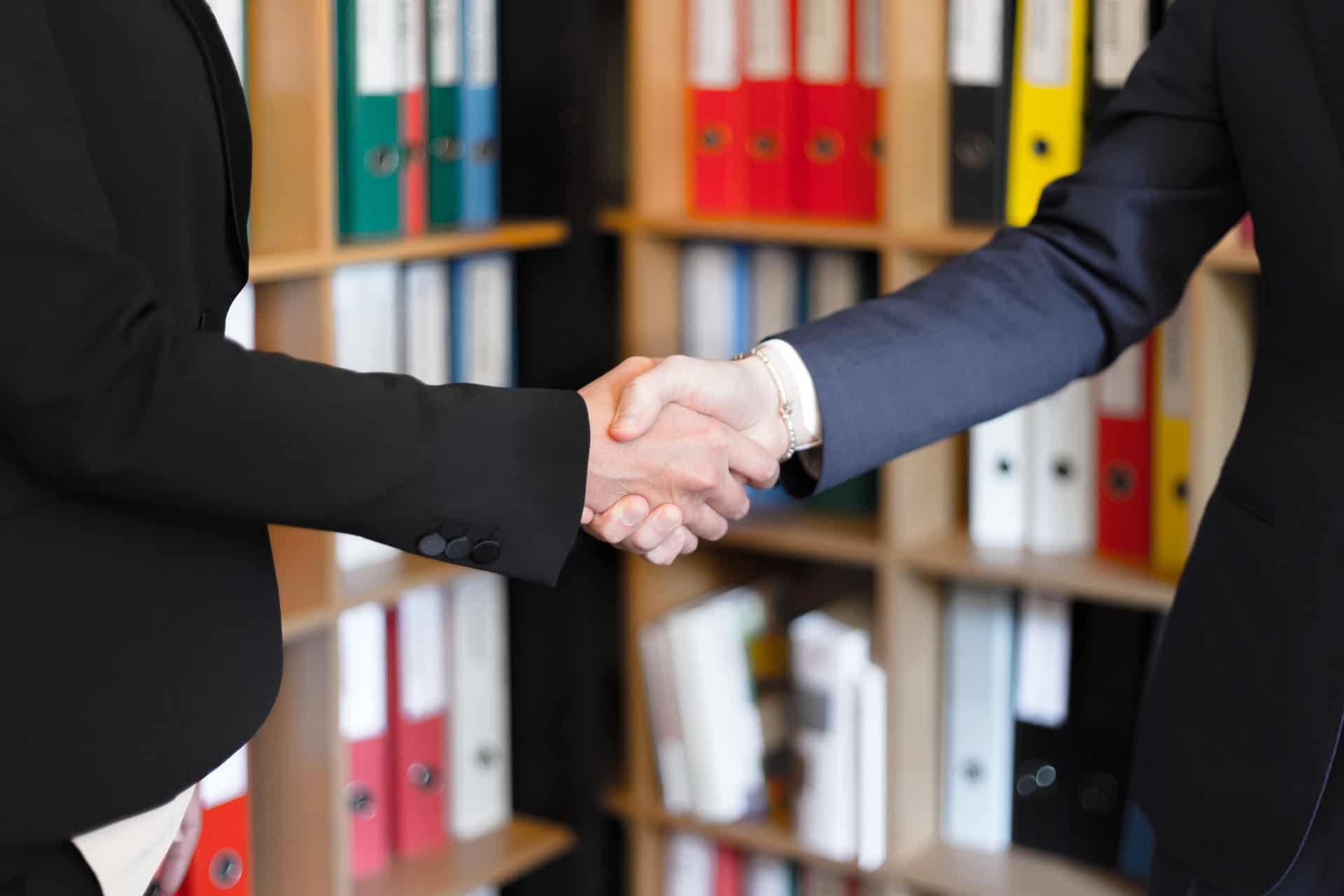 business people shaking hands